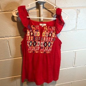 Beautiful red tank with designs